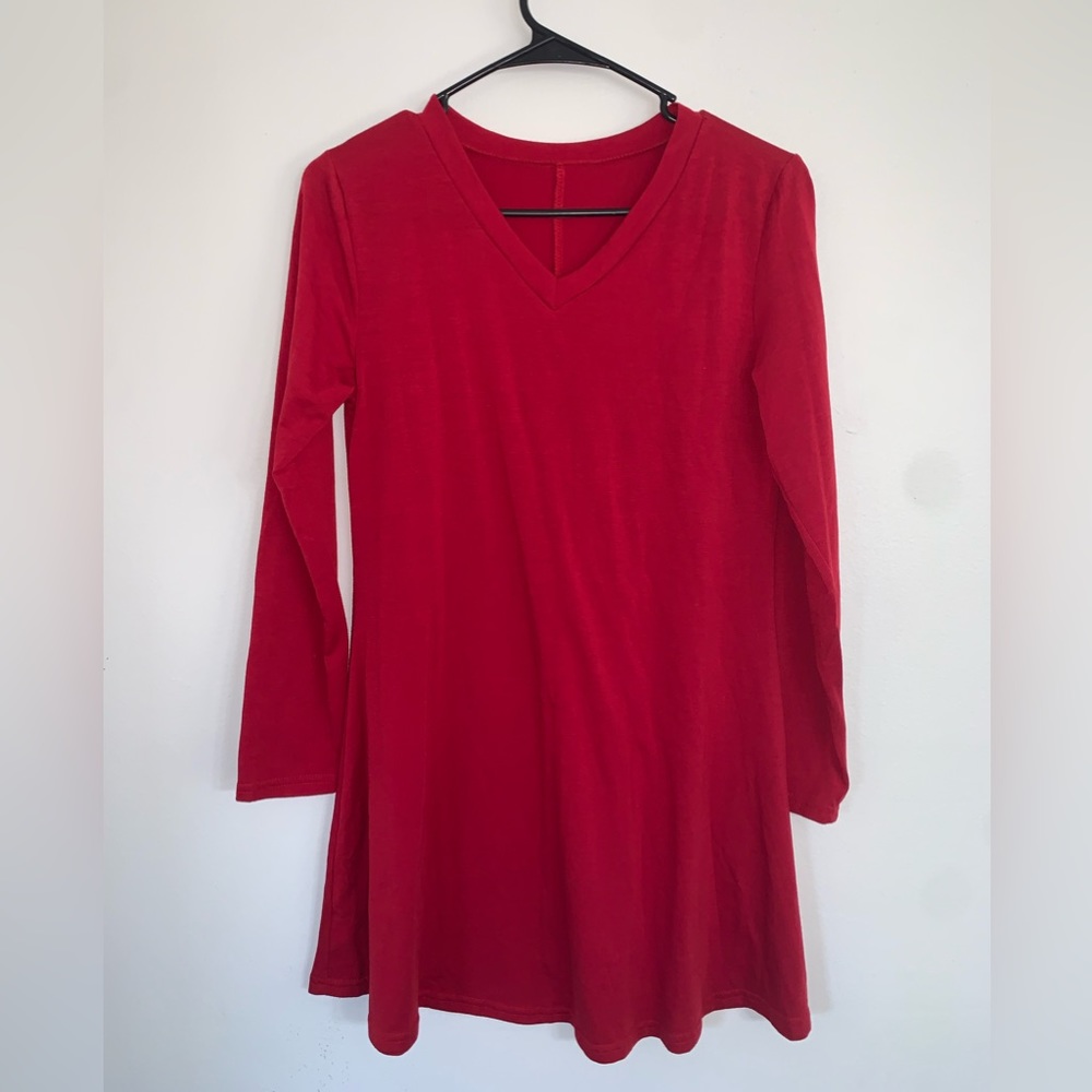 Red long sleeve tunic. OS but fits like a medium